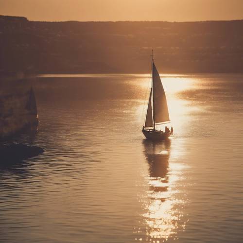 Vintage sailboat exploring the world on a shimmering sea at sunset.