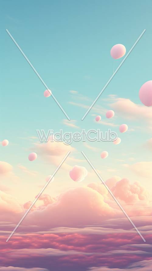 空に浮かぶピンクの風船と綿菓子の雲