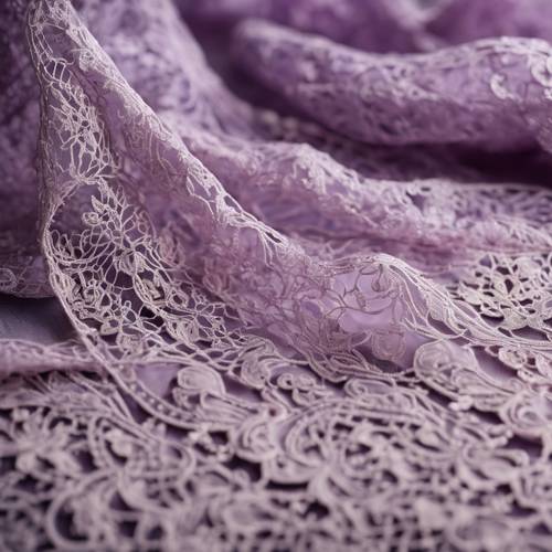 A close-up of a delicate purple lace fabric.